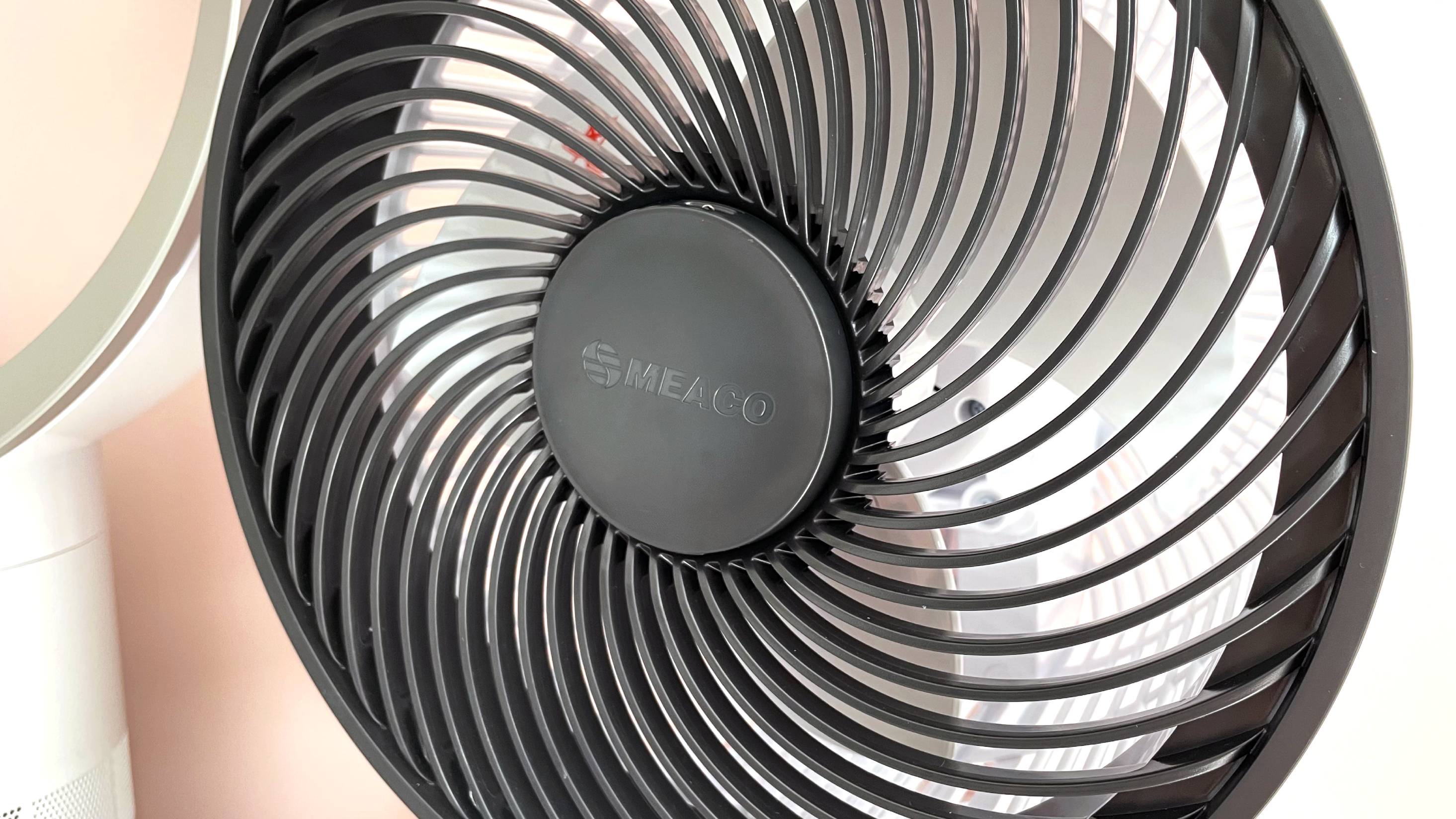 The MeacoFan remote control is in place on the front of the air circulator.