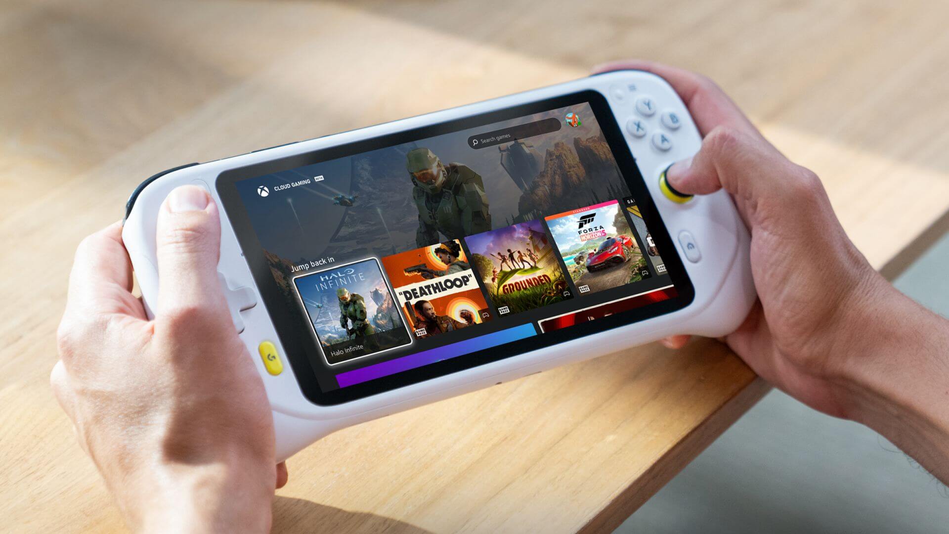 Someone using the Logitech G Cloud with the screen showing a range of video games