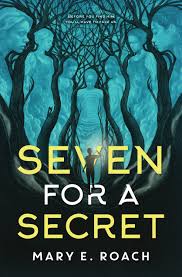 the cover of the book seven for a secret with a person walking through the woods and women carved out of trees