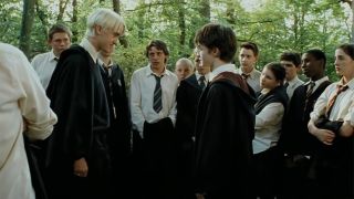 Draco Malfoy and Harry Potter going face to face during Care of Magical Creatures class in The Prisoner of Azkaban.