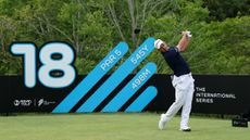 Lucas Herbert hits a drive off the 18th tee during round two of the International Series Philippines