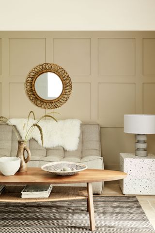 A small living room with a muted, warm tonal scheme