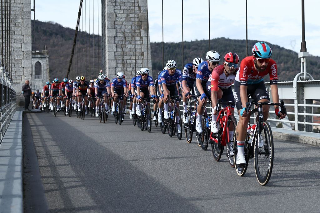 The pack of riders cycle on the road bridge of VoultesurRhone during the 5th stage of the 81st Paris Nice cycling race 2125 km between SaintSymphoriensurCoise and SaintPaulTroisChateaux on March 9 2023 Photo by AnneChristine POUJOULAT AFP Photo by ANNECHRISTINE POUJOULATAFP via Getty Images