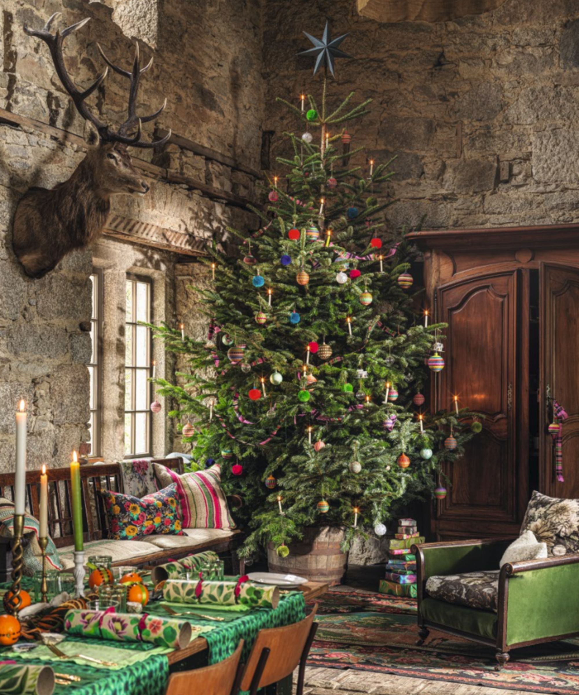 Colorful Christmas scene with a table and tree in a rustic setting