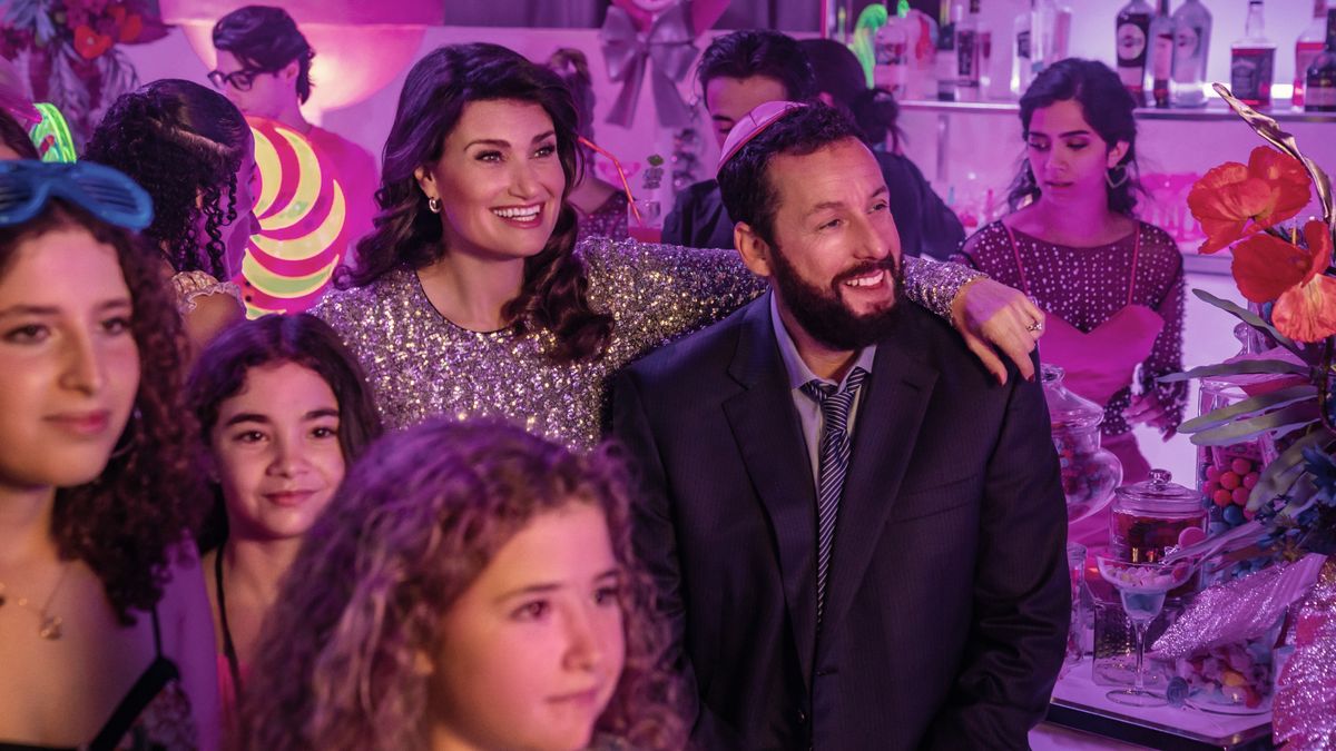 Idina Menzel and Adam Sandler smiling in You Are So Not Invited to My Bat Mitzvah