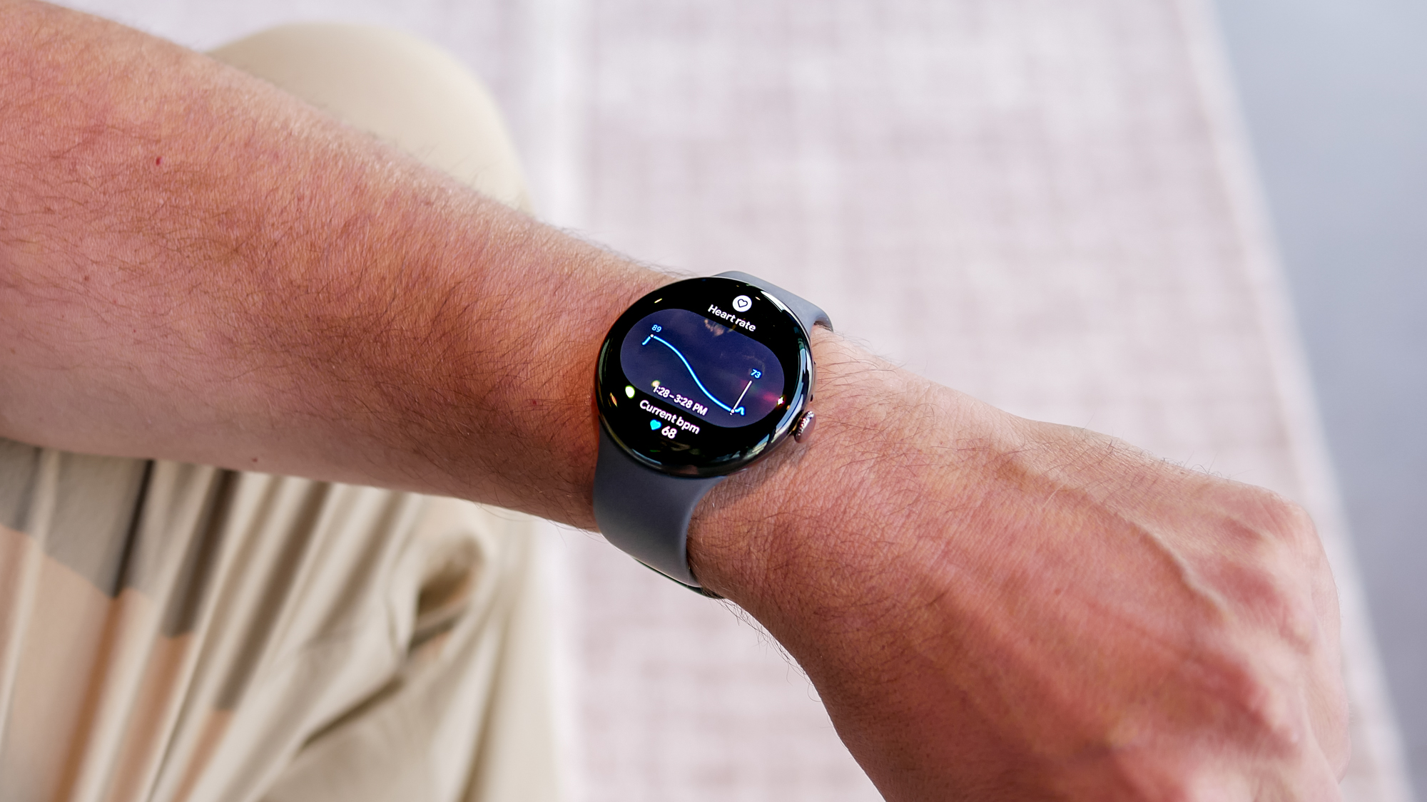 Close-up of the Google Pixel Watch 4 on a user's wrist