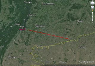 This map shows the ground projection of the trajectory of the Chelyabinsk meteor, or bolide, and the location of the impact hole (Crater) in the ice of Lake Chebarkul on Feb. 15, 2013. The bolide moved from right to left.