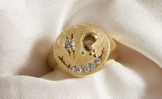 Kasun gold signet ring with diamond smile