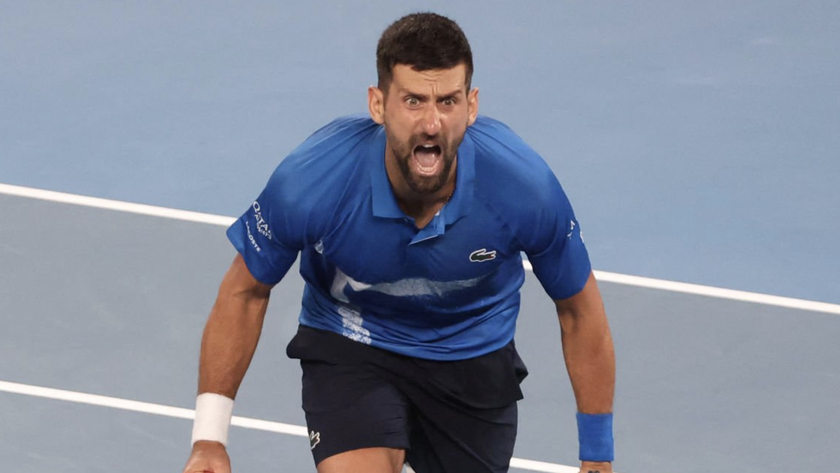 Serbia&#039;s Novak Djokovic celebrates after his victory against Spain&#039;s Carlos Alcaraz to reach the men&#039;s semi-final at the Australian Open tennis tournament in Melbourne.