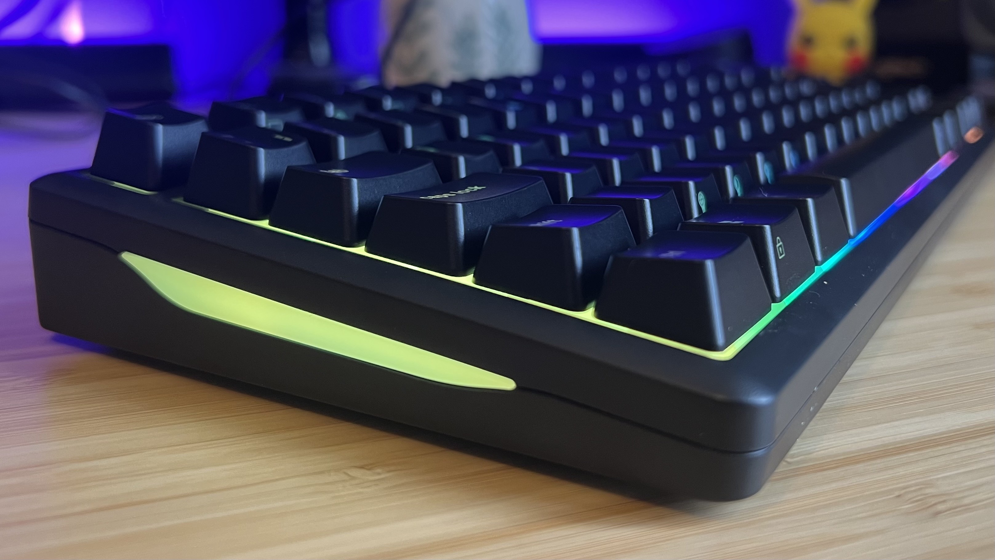 Close up on RGB strip lighting on the side of Glorious GMBK 75% keyboard
