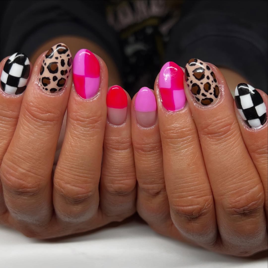 leopard nails with red and pink checkered accent nails