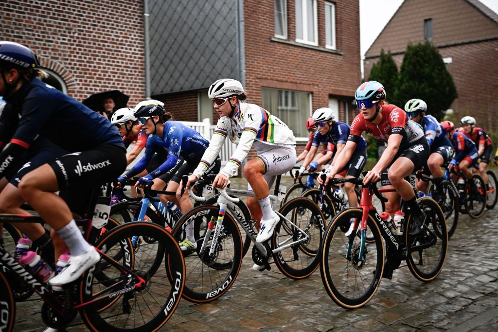 Belgian Lotte Kopecky of SD Worx - Protime (C) competes in the women's race of the 'Ronde van Vlaanderen' (Tour des Flandres) one day cycling race, 163 km from Oudenaarde to Oudenaarde, on March 31, 2024. (Photo by JASPER JACOBS / Belga / AFP) / Belgium OUT