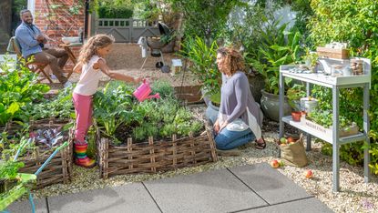 kitchen garden ideas: bradstone Mahina concrete paving in kitchen garden