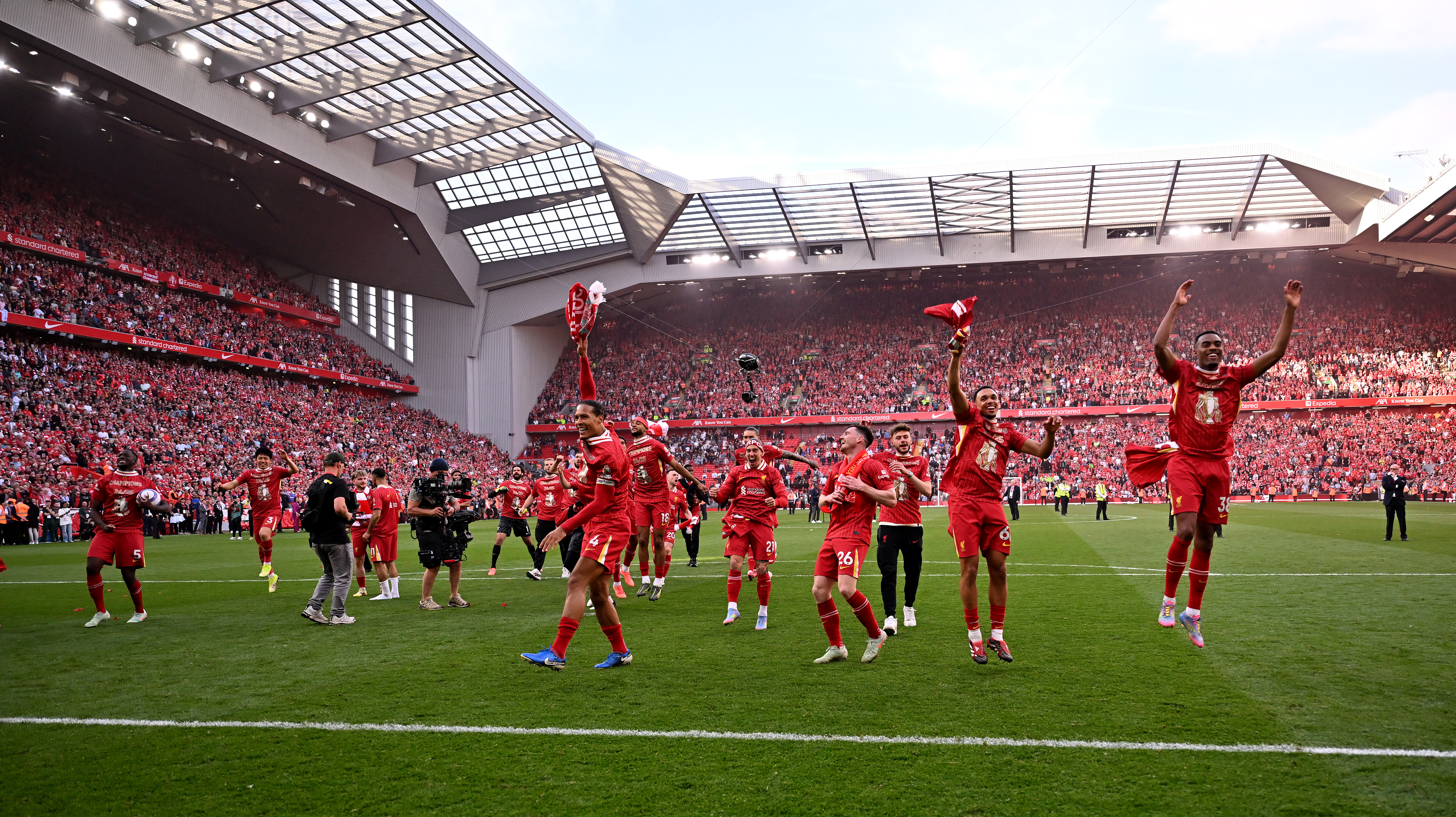 Liverpool players salute their fans after a 5-1 win over Tottenham at Anfield sealed the Premier League title for Arne Slot's side in April 2025.