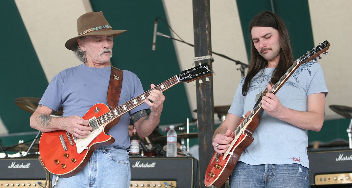 Dickey and son Duane Betts jam together onstage in 2007