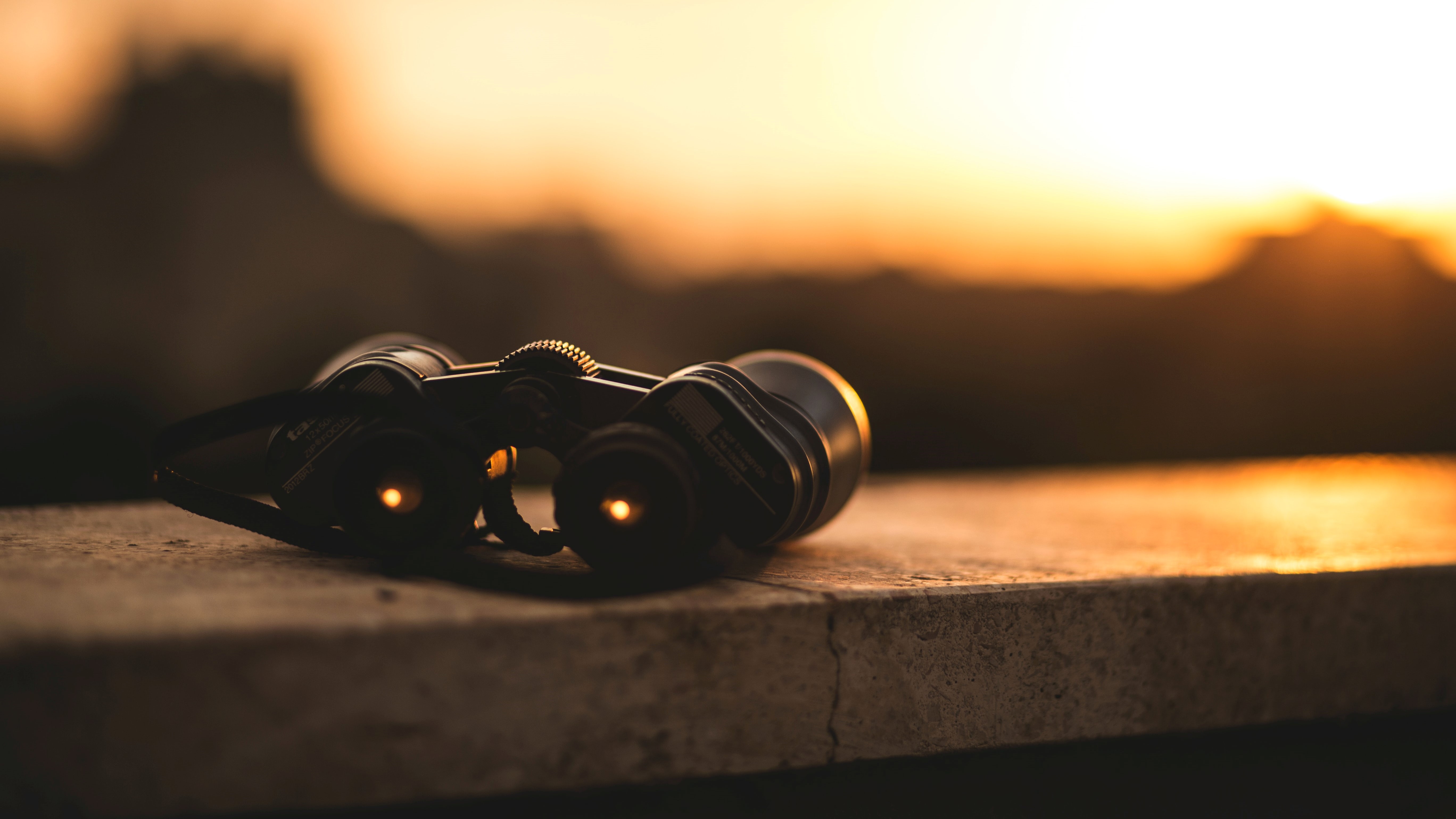 Binoculars on ledge