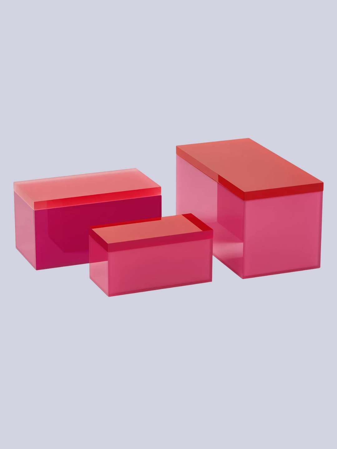 A set of 3 pink and orange storage boxes from Westwing