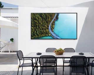 Samsung The Terrace TV mounted to wall in patio area