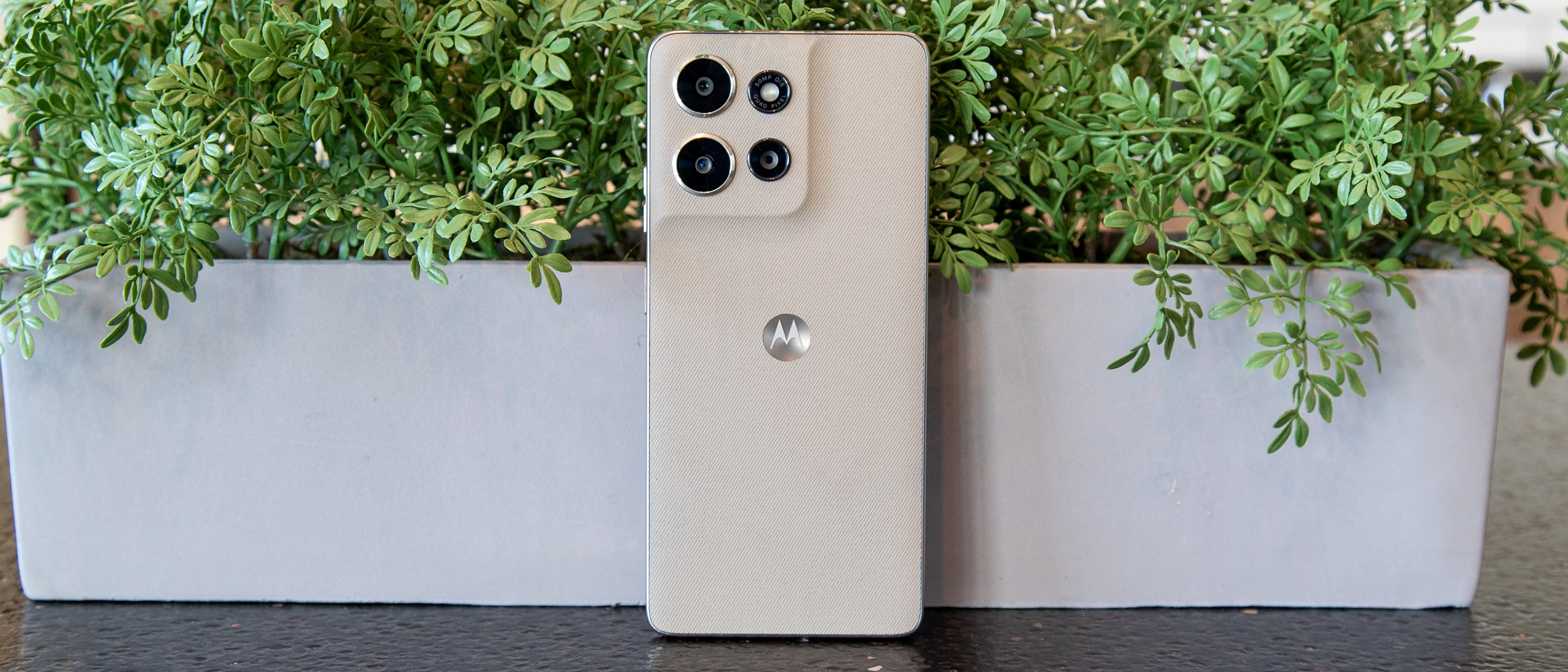 Moto G Power 2026 in front of a planter
