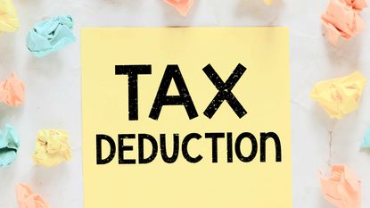 post-it note with "standard deduction" written on it