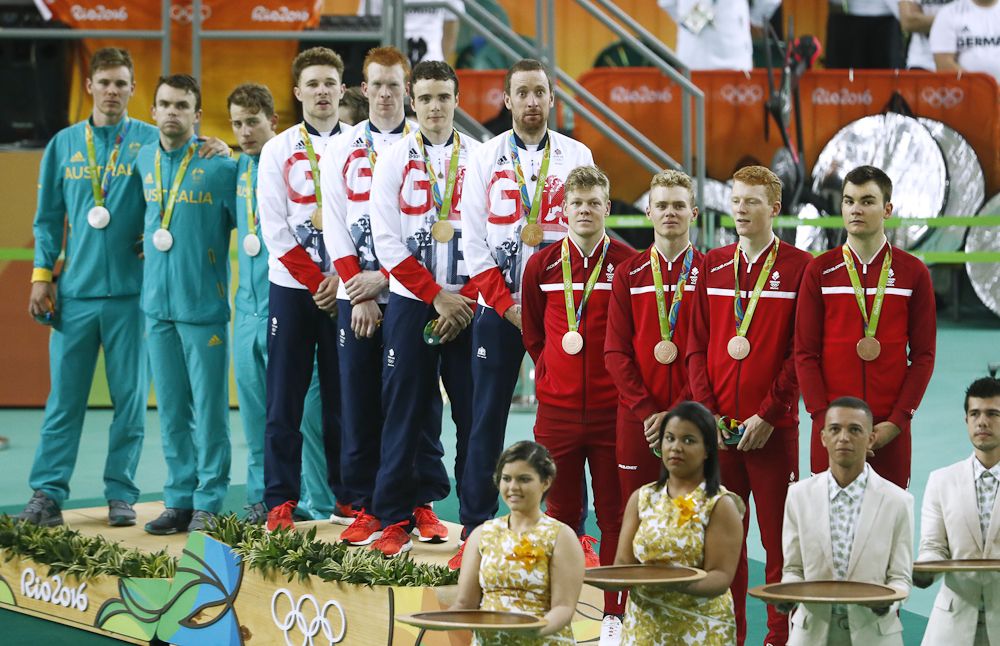 Silver medallists Australia's Michael Hepburn, Australia's Jack Bobridge and Australia's Sam Welsford, gold medallists Britain's Owain Doull, Britain's Edward Clancy, Britain's Steven Burke and Britain's Bradley Wiggins and bronze medallists Denmark's Lasse Norman Hansen, Denmark's Niklas Larsen, Denmark's Frederik Madsen and Denmark's Casper Von Folsach pose on the podium after the men's Team Pursuit