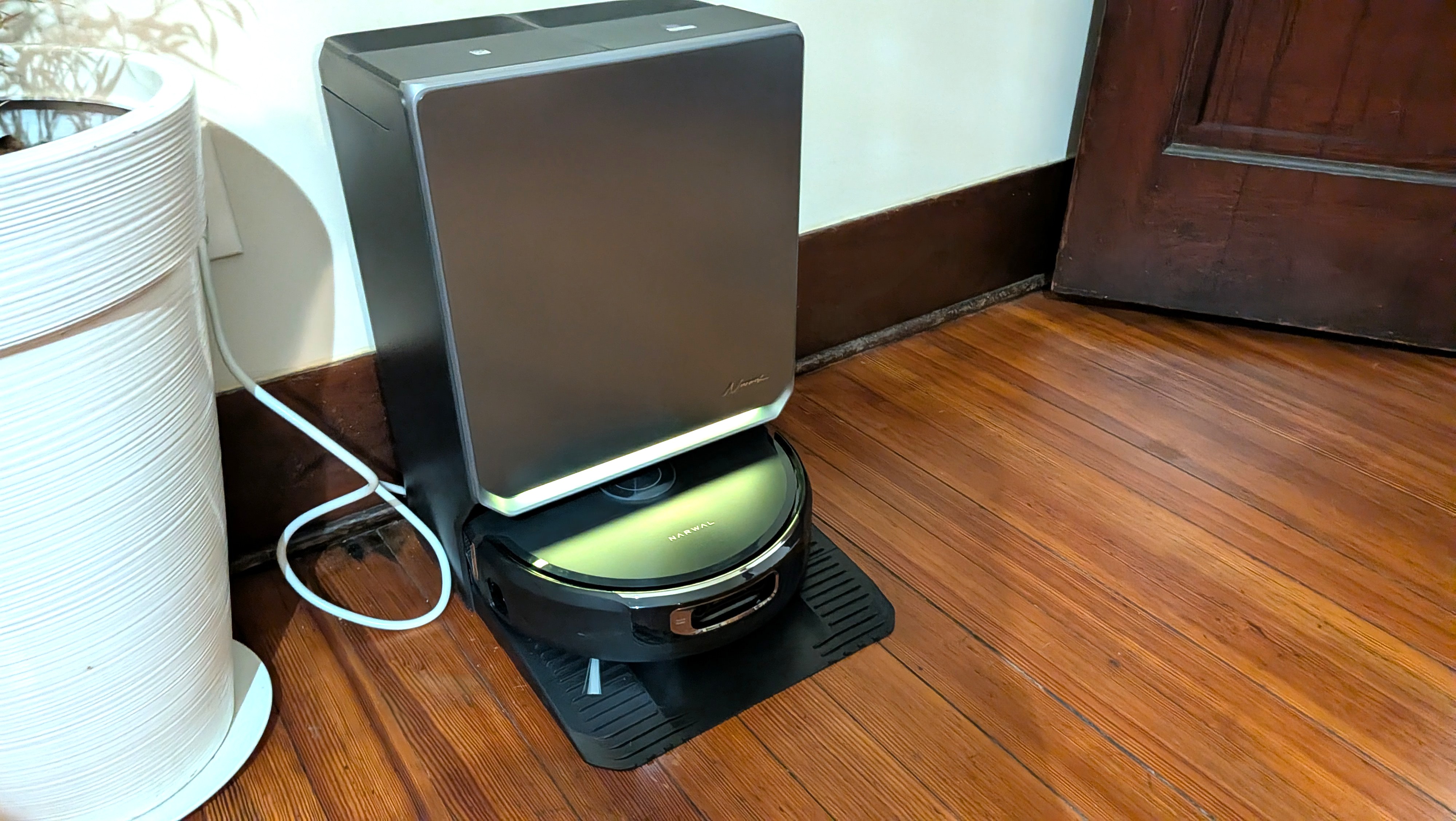 Narwal Flow 2 robot vacuum in charging dock
