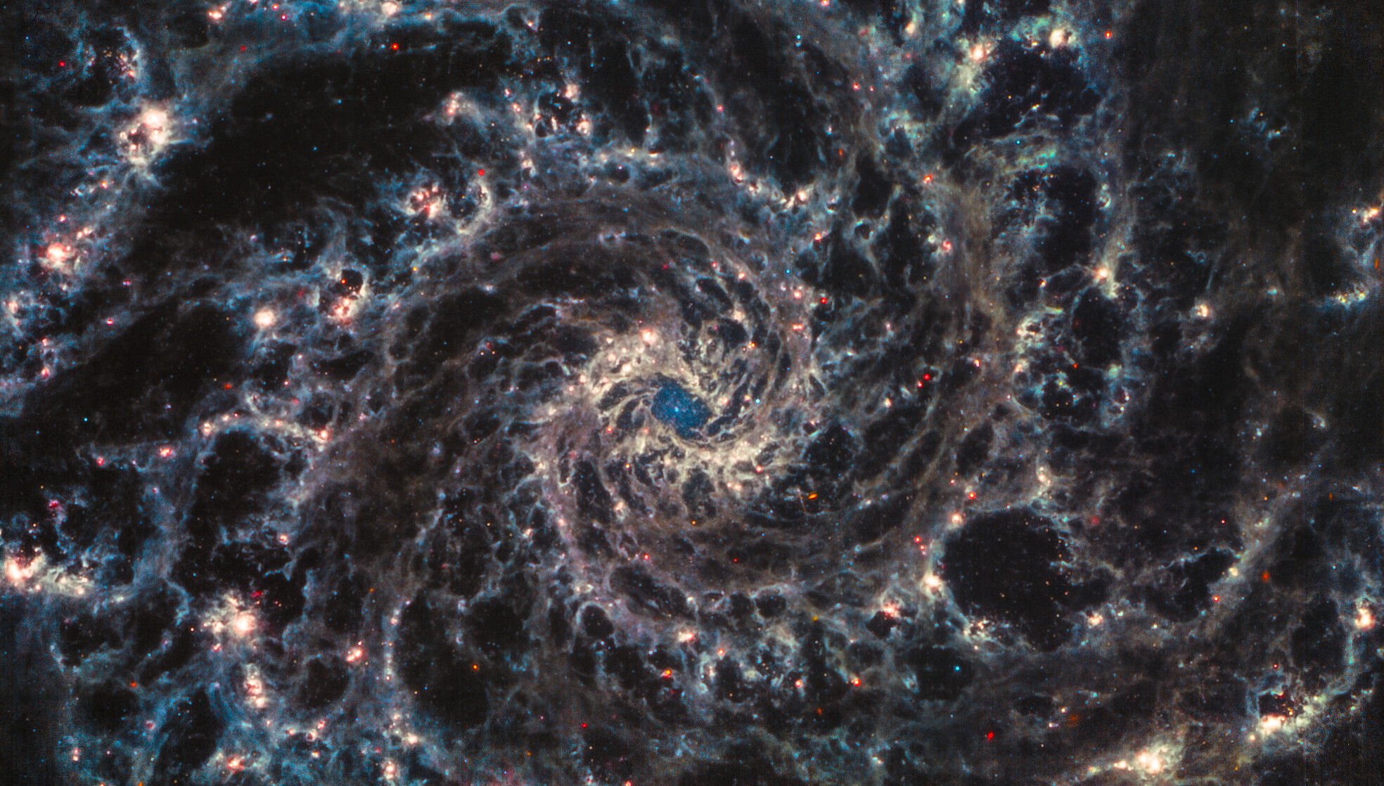 a swirling dark galaxy captured in infrared light
