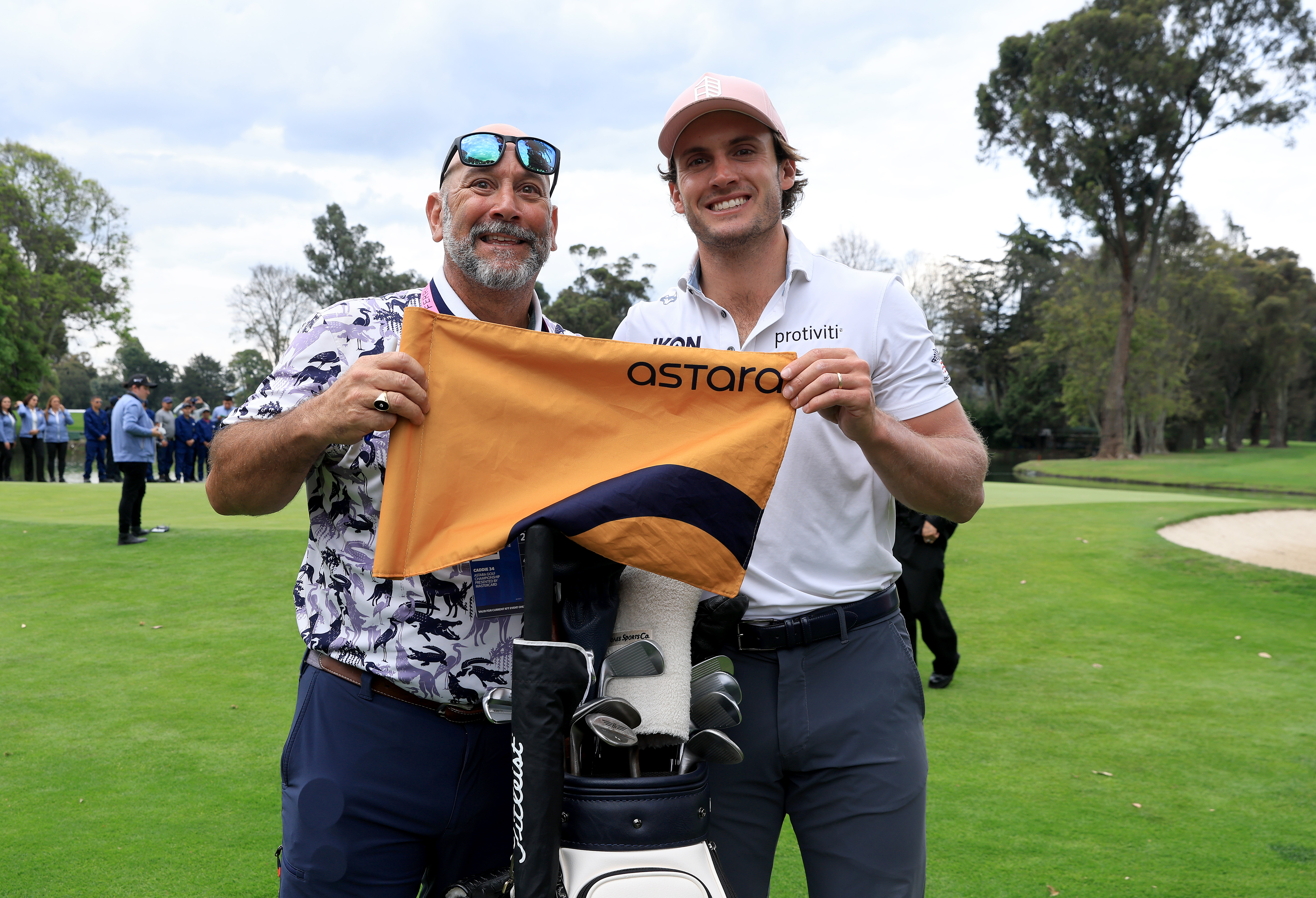 James Nicholas and his caddie Brian after their win at the 2026 Astara Golf Championship in Bogota, Colombia