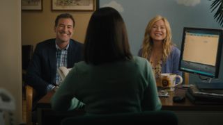 Mark Duplass and Ellen Pompeo as Michael and Kristine smiling in Good American Family