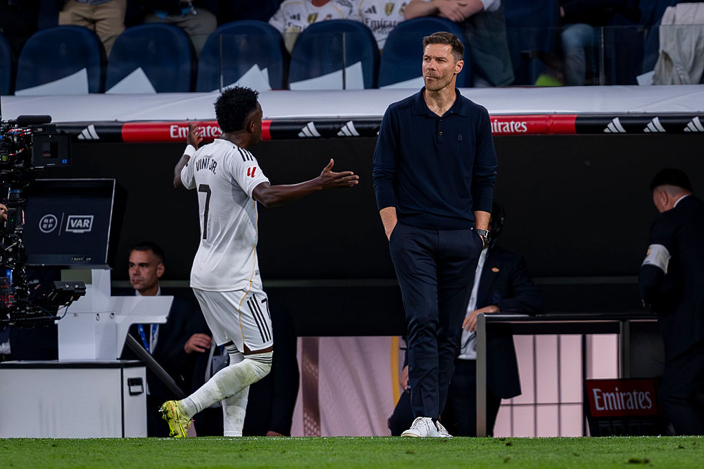 Vinicius Jr of Real Madrid protests following his replacement with Xabi Alonso, head coach of Real Madrid, during the LaLiga EA Sports football match between Real Madrid CF and FC Barcelona at Estadio Santiago Bernabeu in Madrid, Spain, on October 26, 2025.