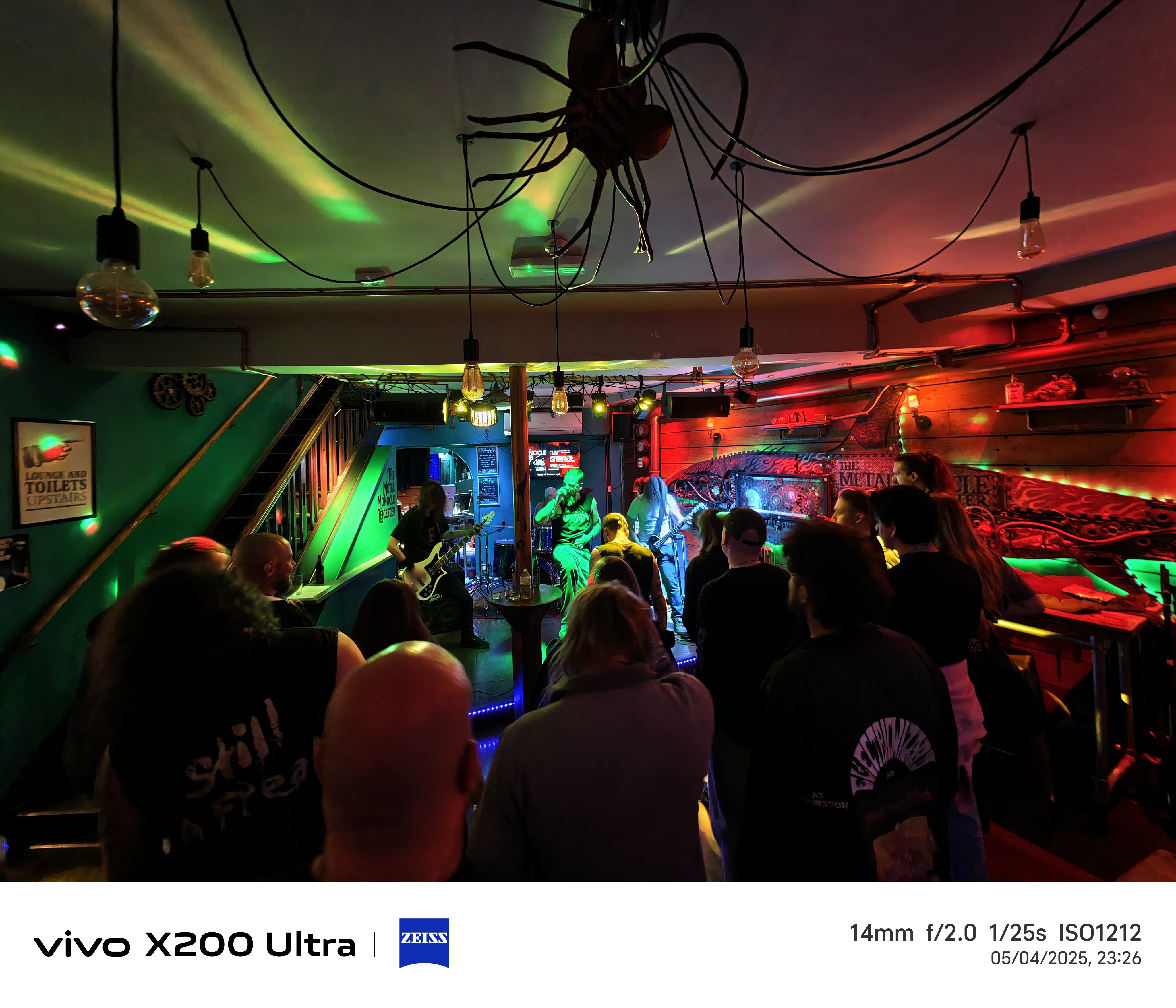 gig on a bar at night lit by neon