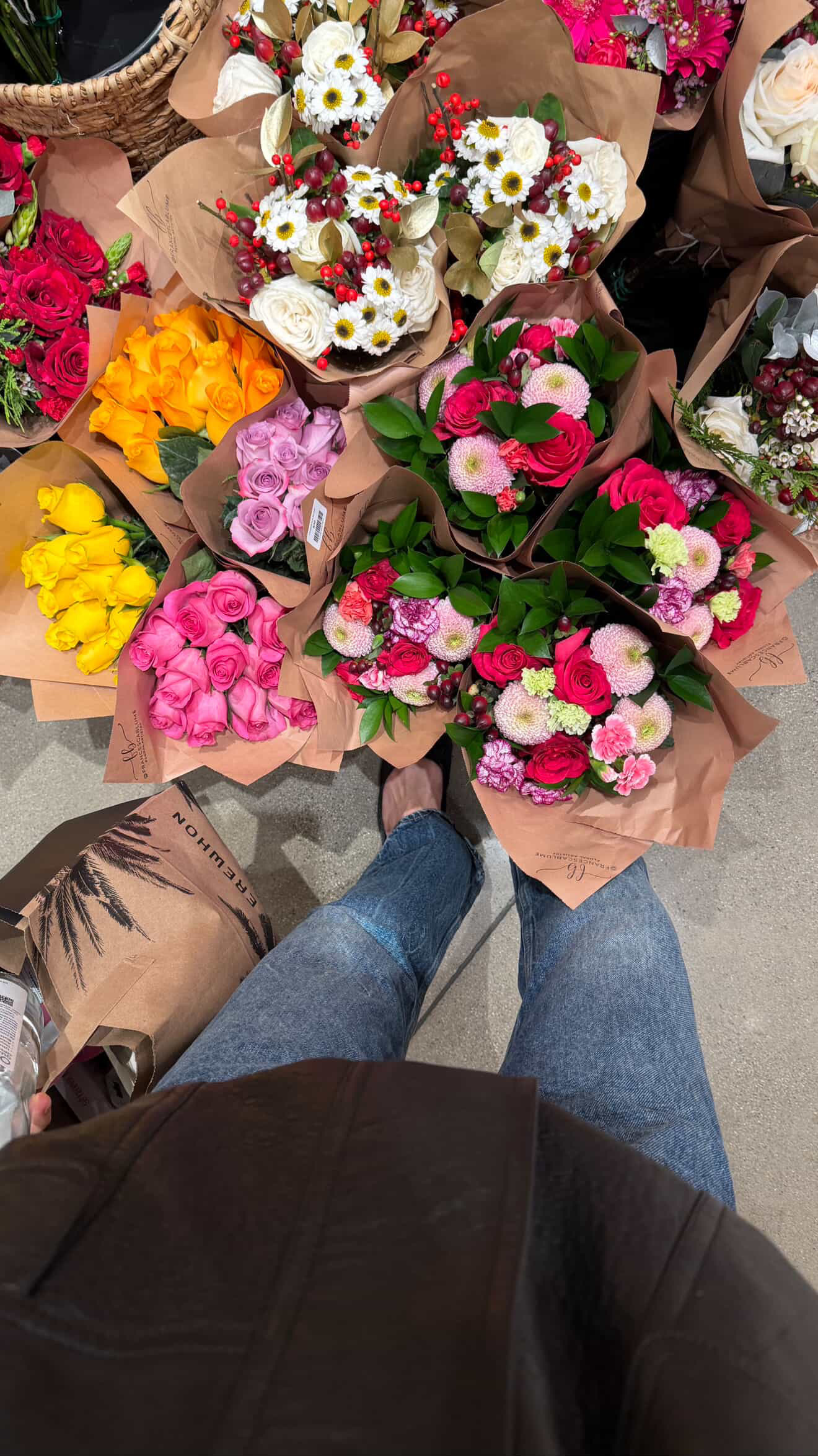 Courtney wears zara x aaron levine jeans in the zara dressing room.