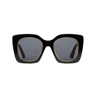 Pair of thick framed black Gucci sunglasses