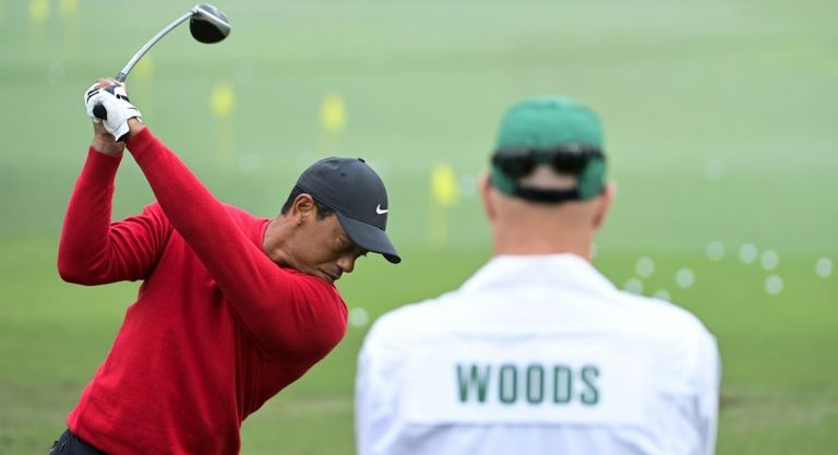 Woods hits a driver