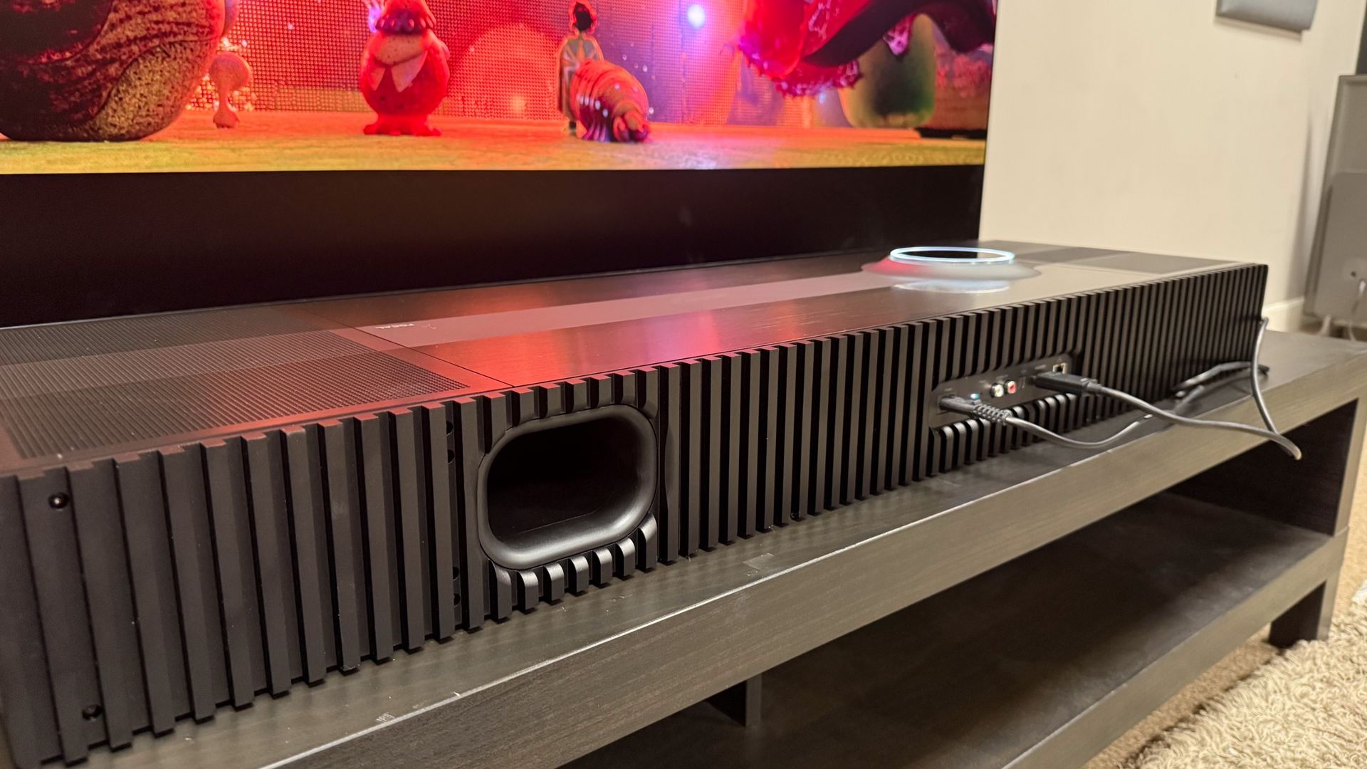 Focal Mu-so Hekla review: a potent, super-immersive wireless speaker in a sleek soundbar's clothing 7 The Focal Mu-so Hekla from behind showing its bass port and the movie Elio reflected in its surface.