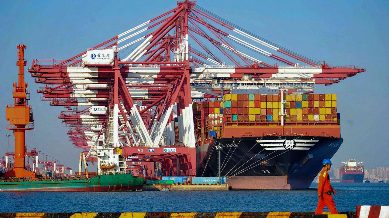 Container ship at Qingdao port in China 