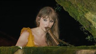 Taylor Swift performing in The Eras Tour concert film.