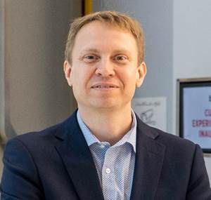 Headshot of Anders Olsen.