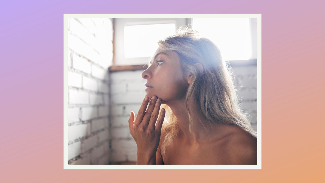 woman applying sunscreen 