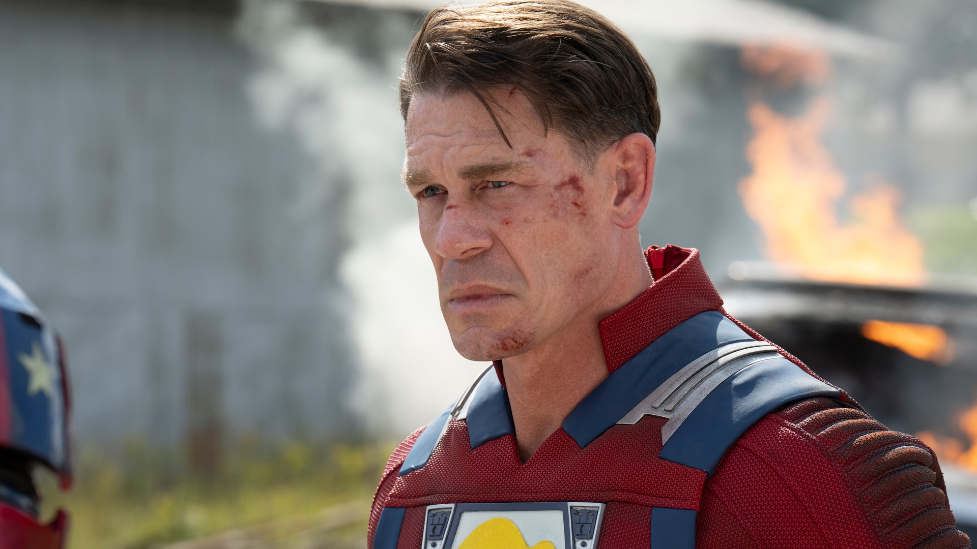 A bruised and battered John Cena as Peacemaker in Peacemaker season 2, episode 7.