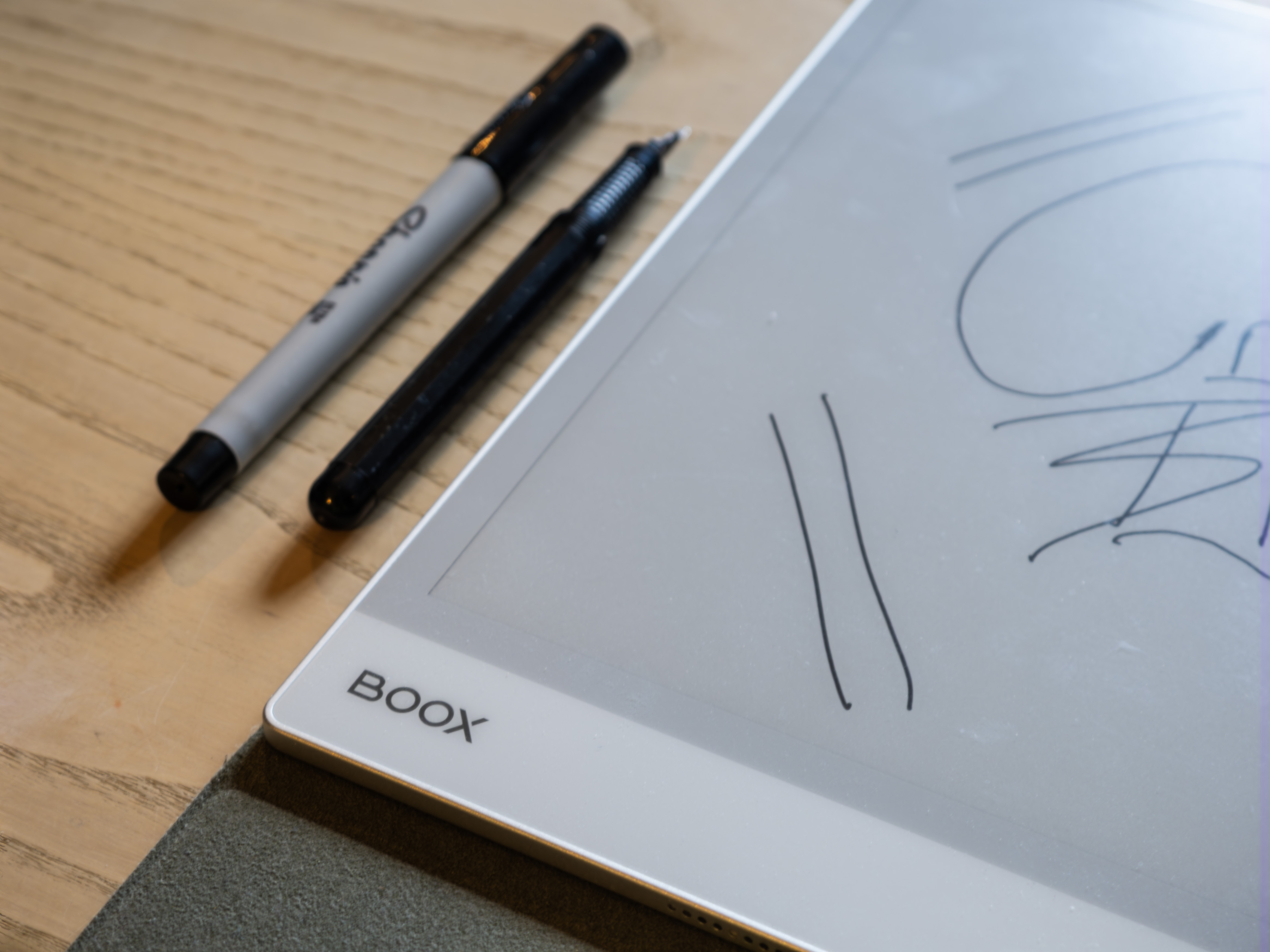 An Onyx Boox Note Max ereader on a desk