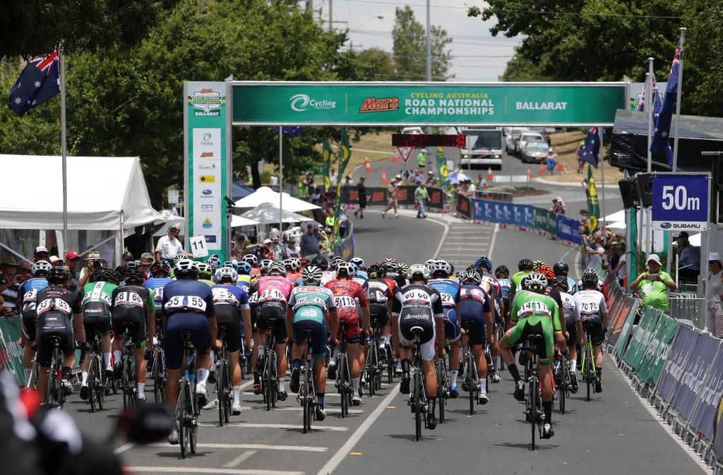 The peloton rolls through to complete an early lap