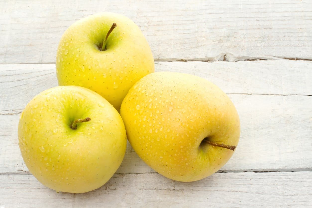 Three Golden Delicious Apples