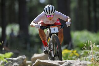 Evie Richards of Team England competes during the Women's Cycling Mountain Bike Cross-country Final of 2022 Commonwealth Games at Cannock Chase Forest on August 03, 2022