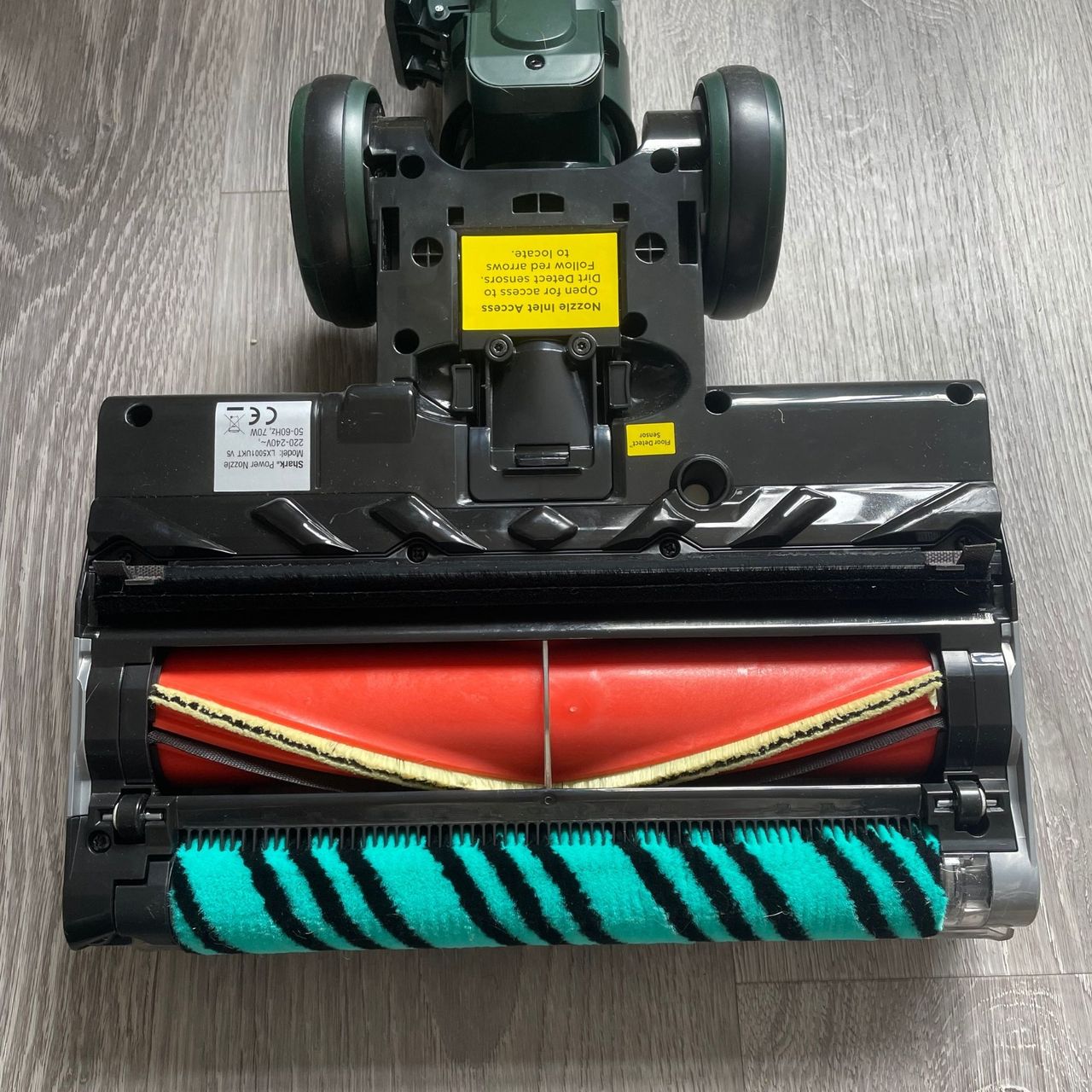 Underside of the Shark PowerDetect Transformer Corded Upright Vacuum Cleaner, showing the rollers of the floorhead