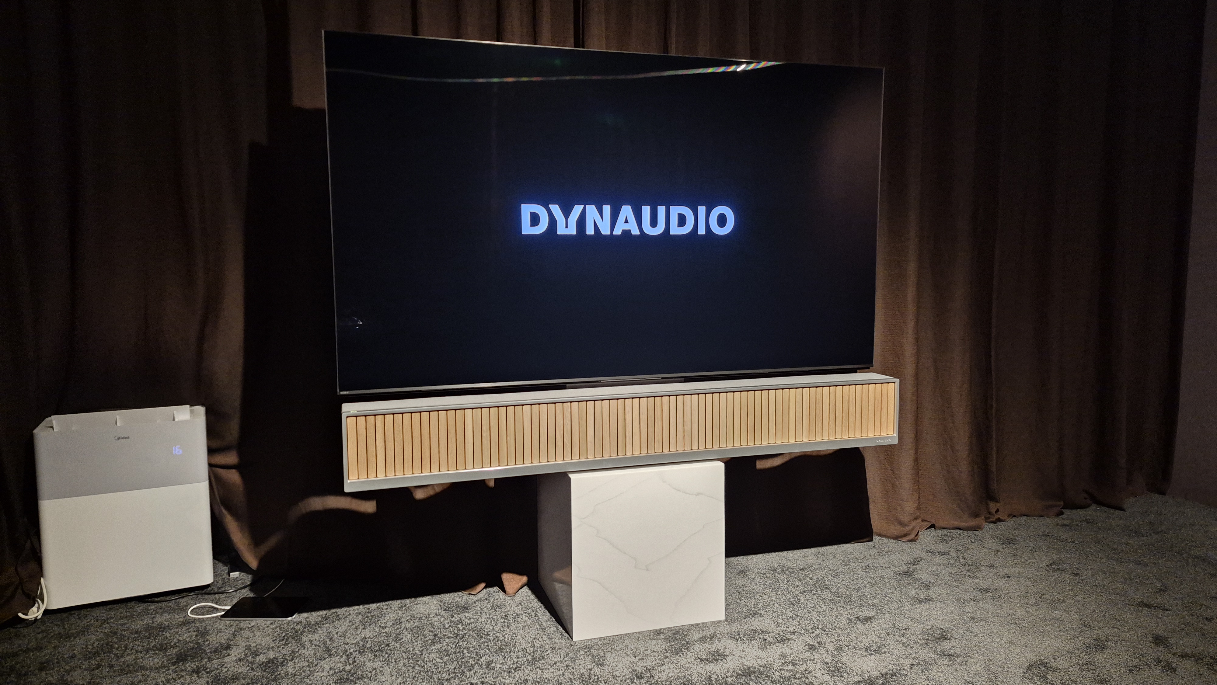 Dynaudio Opus One under TV in demo room