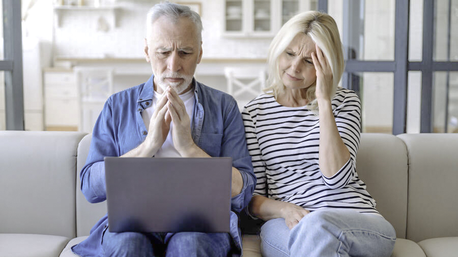 Senior couple on computer