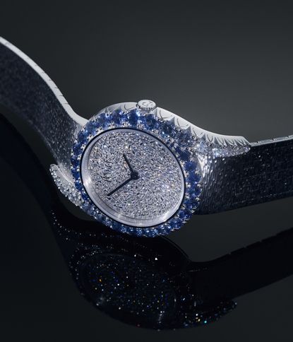 Diamond Piaget watch against dark background