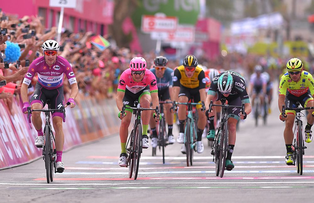 Elia Viviani (Quick-Step Floors), Sacha Modolo (EF-Drapac) and Sam Bennett (Bora-Hansgrohe) sprint to the stage 3 finish line at the Giro d'Italia