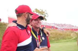 Johnson put his arm round Steve Stricker at the Ryder Cup